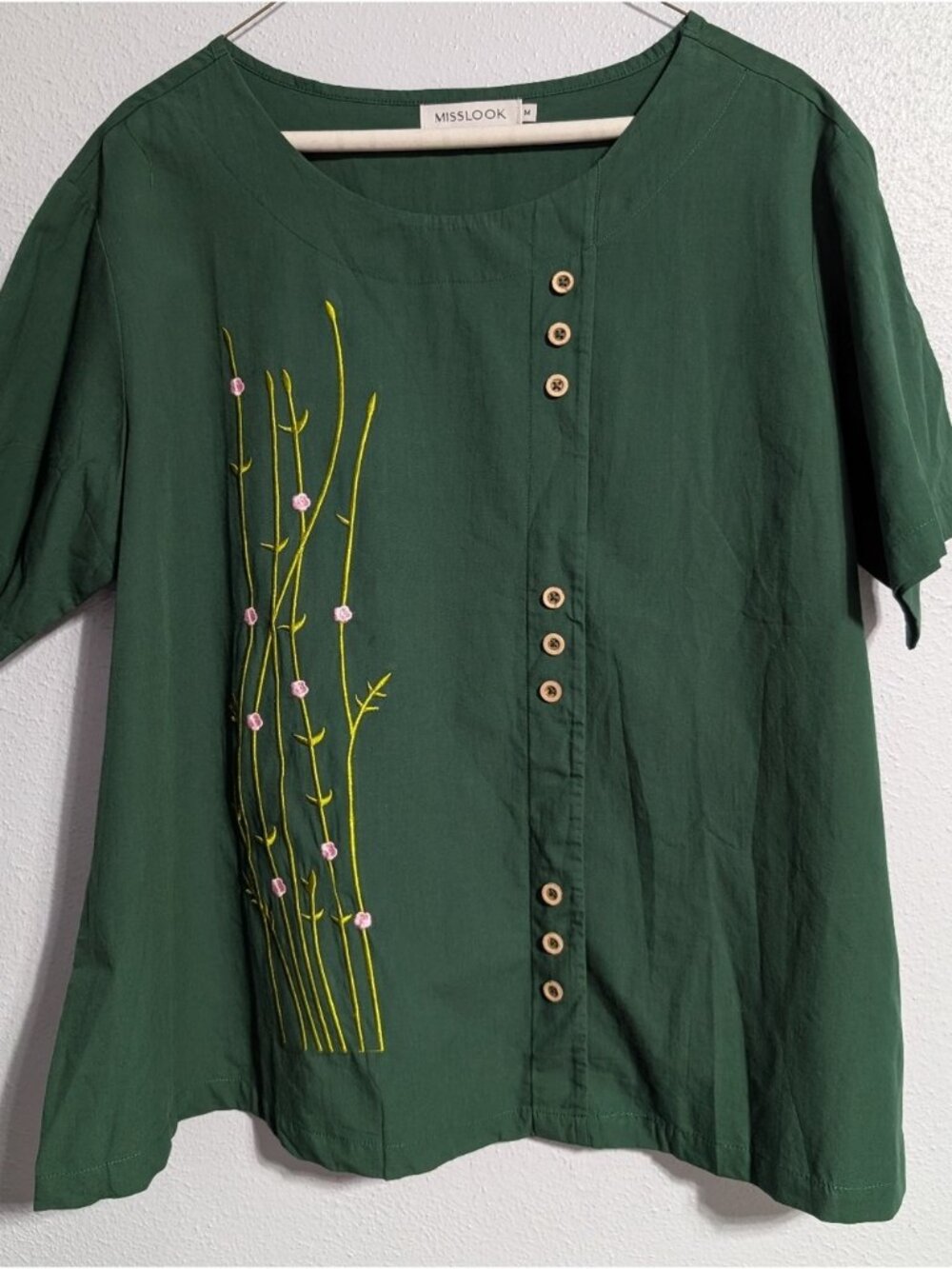 Dark Green Pullover Top with Yellow & Pink Embroidery and Button Design
